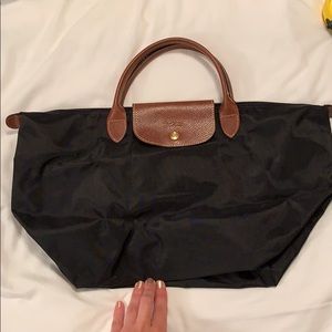Longchamp black Le Pilage bag.